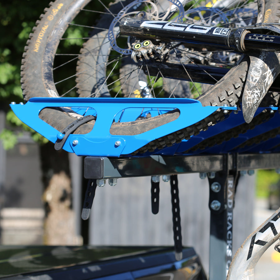 bikes hanging from bike rack RAD RACKS on back of truck